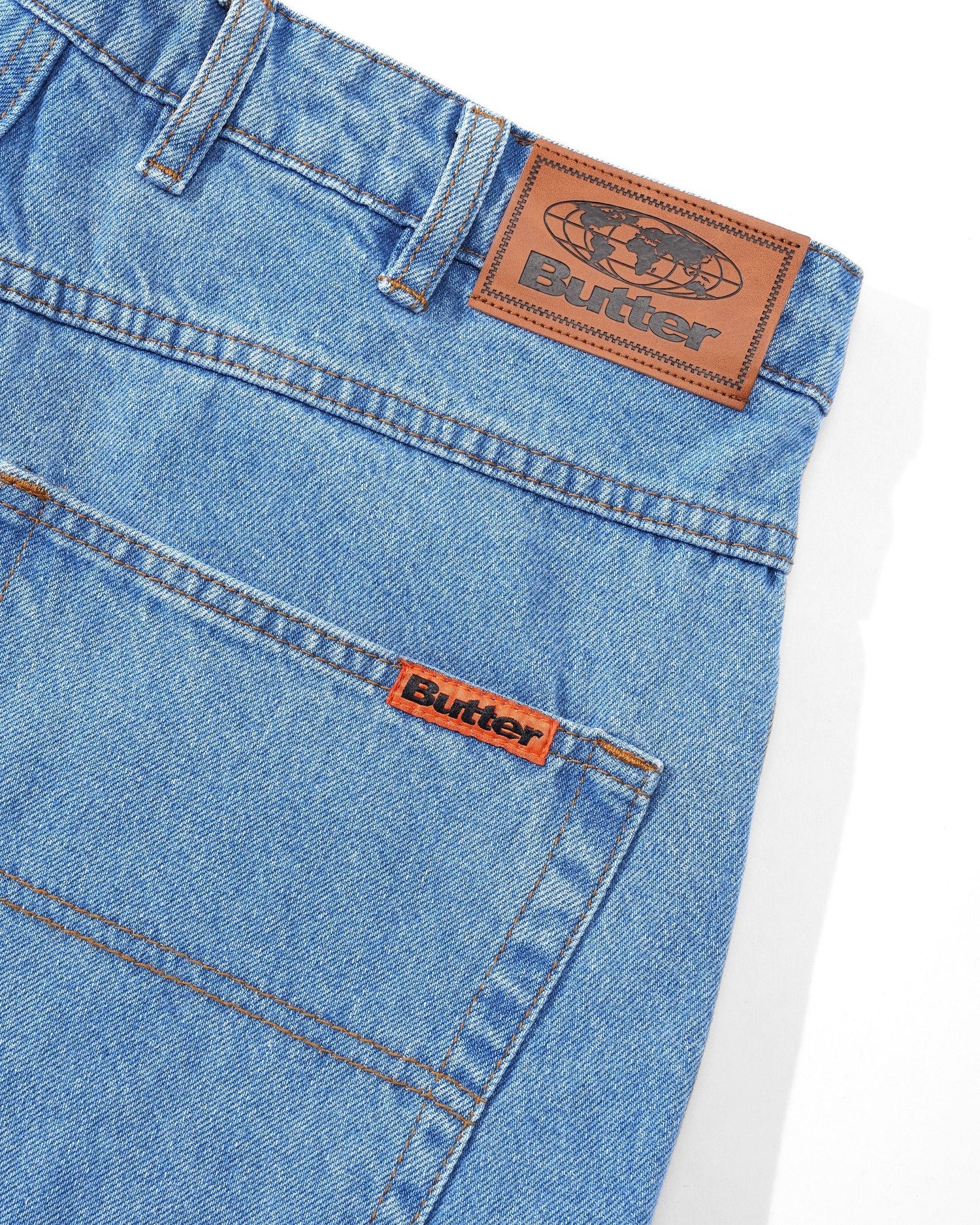 Washed Indigo blue Butter Goods baggy skate jeans back leather patch