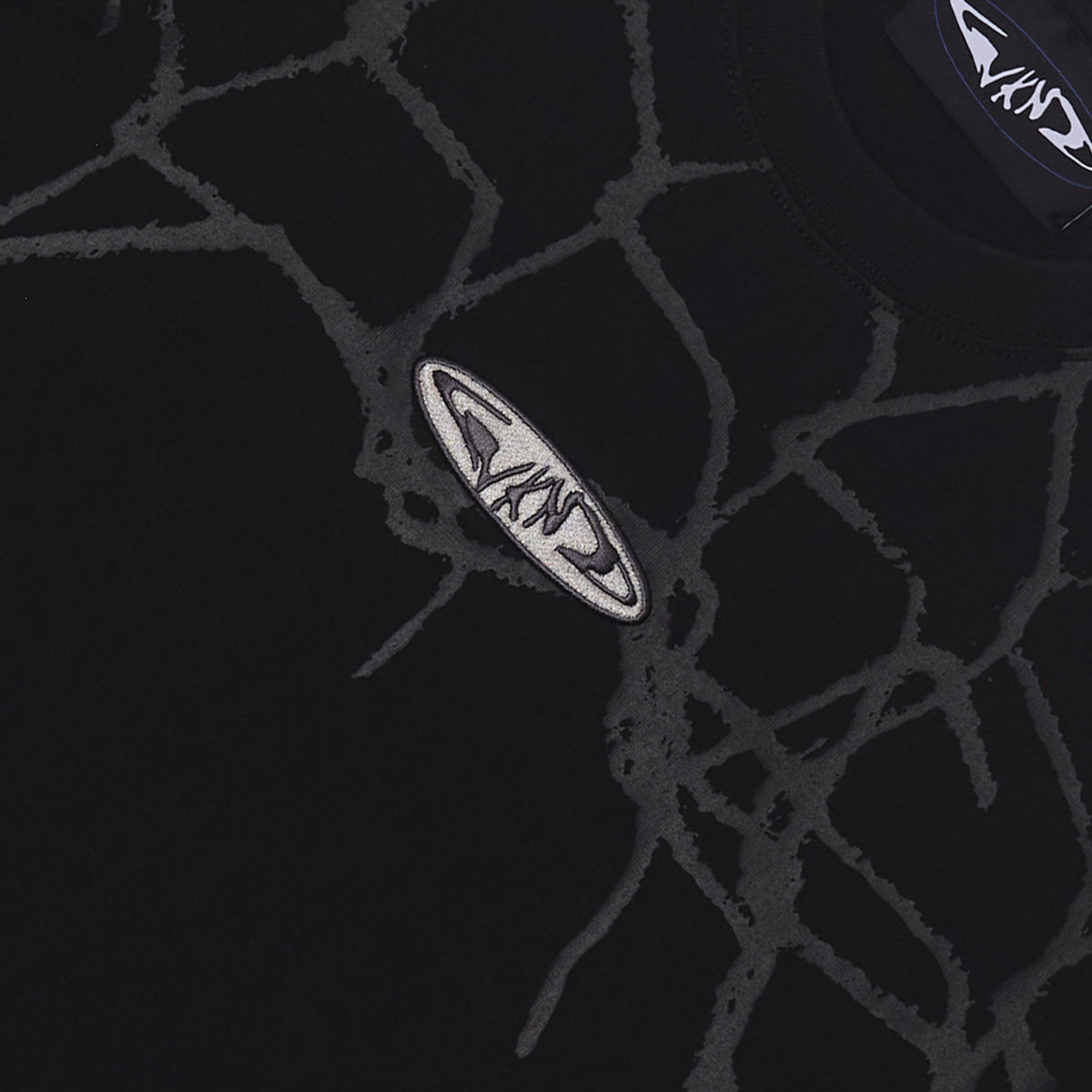 Black WKND skate tee with broken fence oversized print and fishbone logo