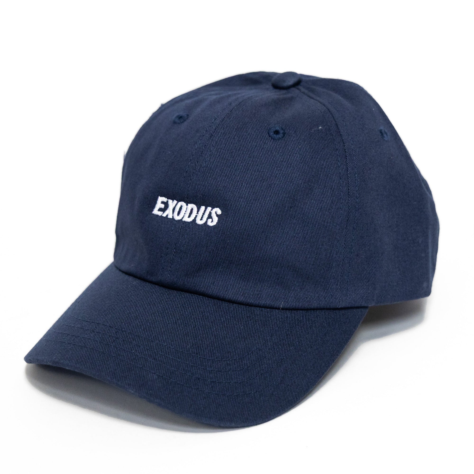 Navy blue skateboarding dad hat with white Exodus logo embroidery
