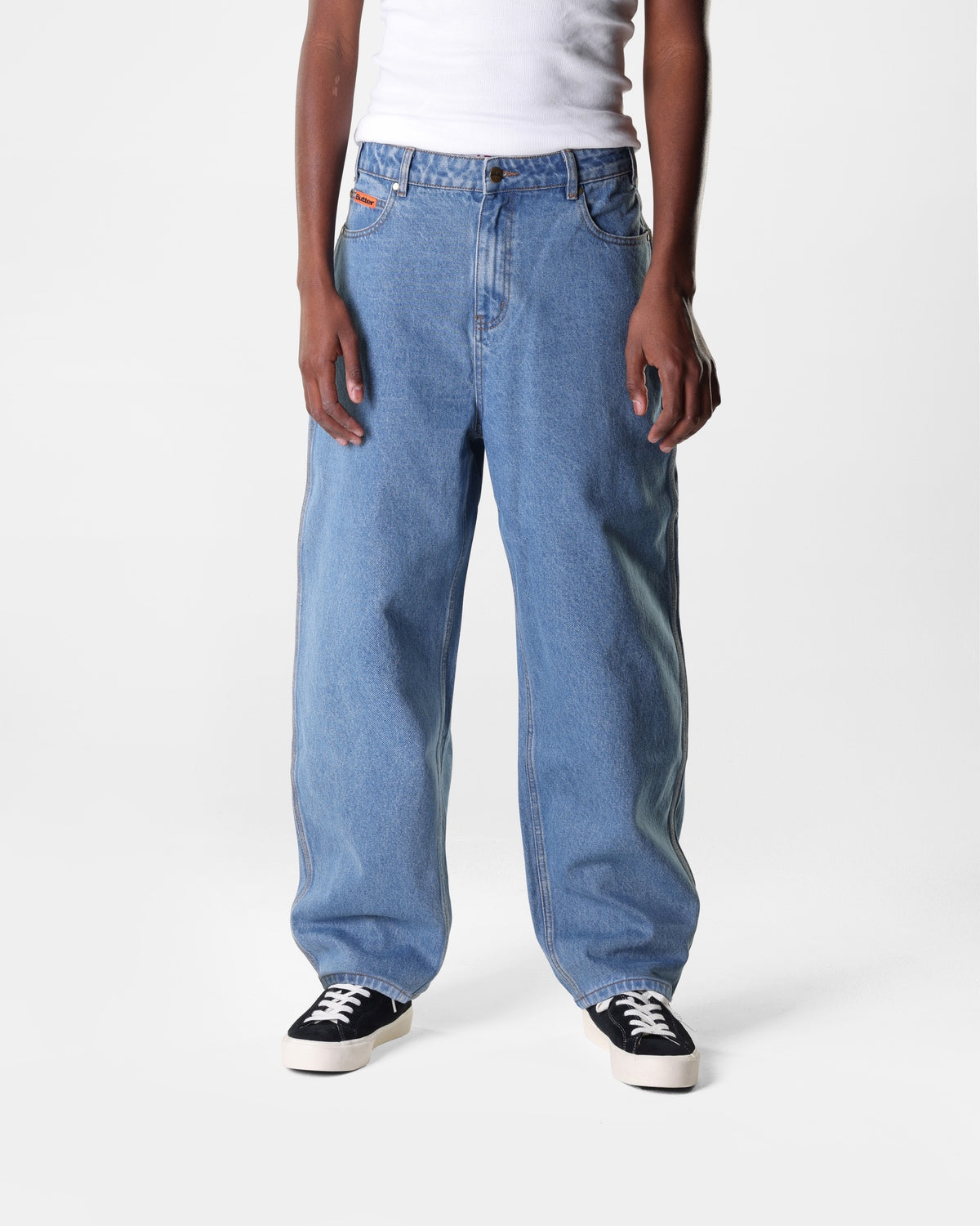 Washed Indigo blue Butter Goods baggy skate jeans on a person