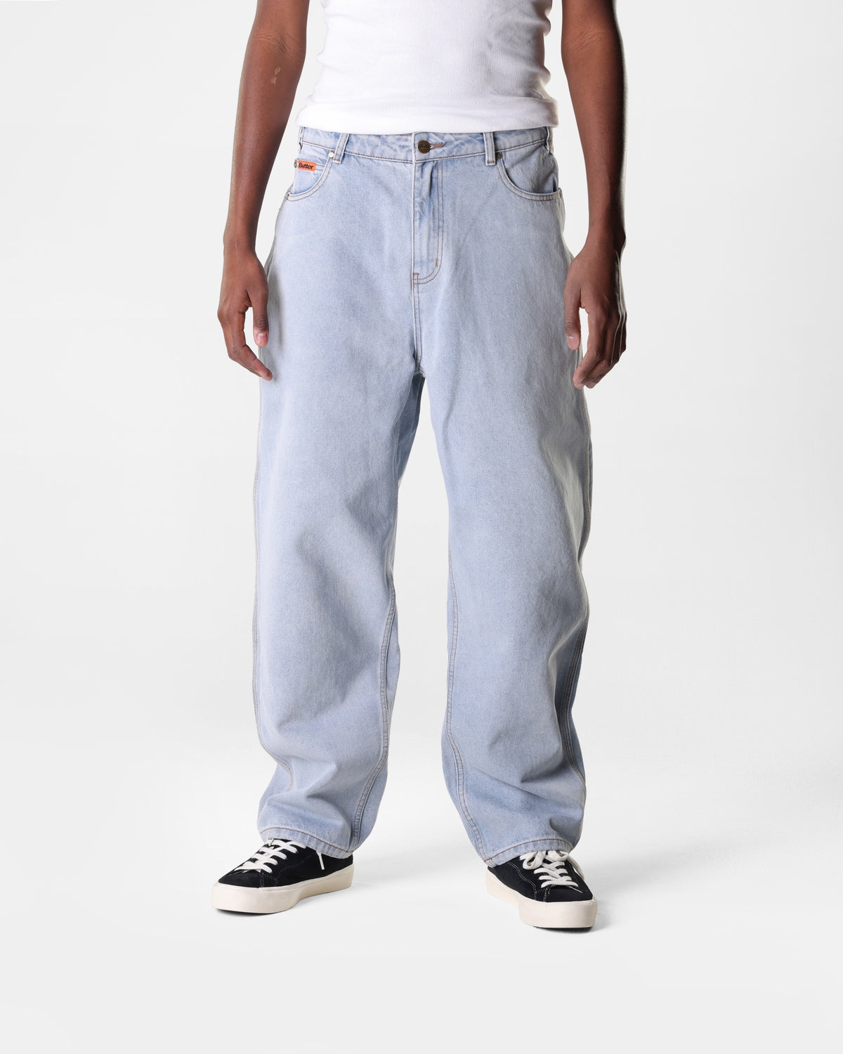 Light blue Butter Goods baggy skate jeans on a person
