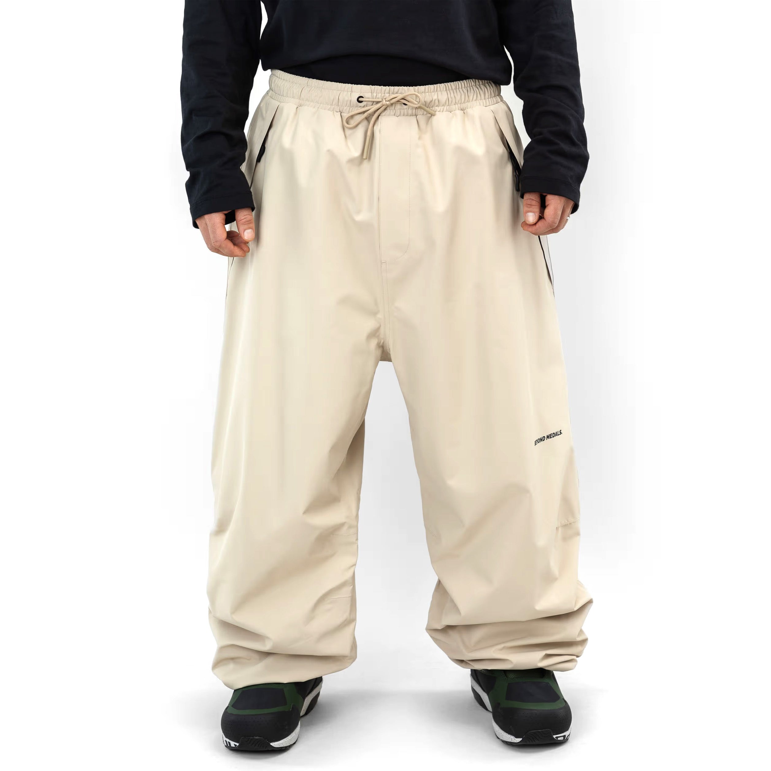 Beige Beyond Medals Park snowboard pant with a baggy fit on body