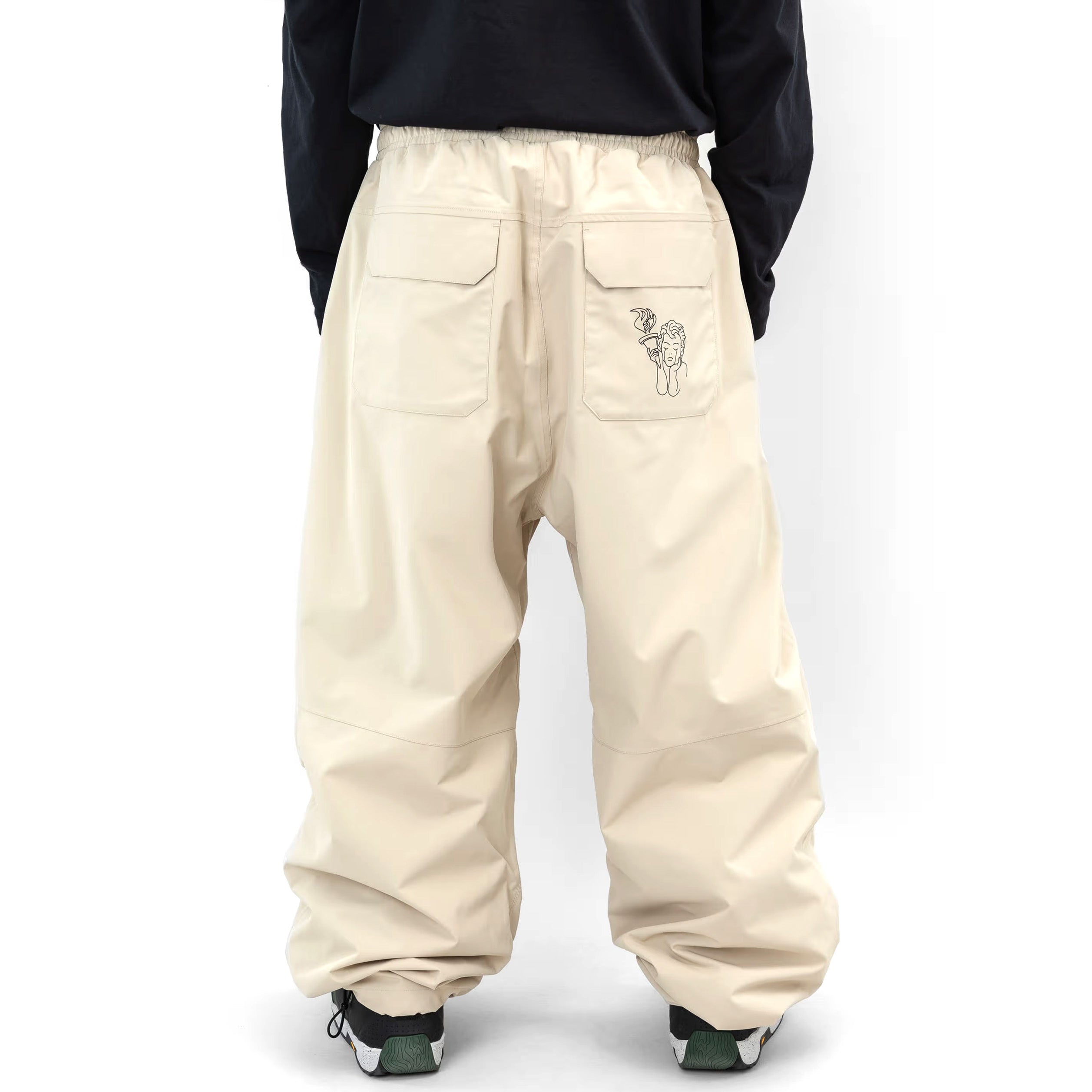 Beige Beyond Medals Park snowboard pant with a baggy fit on body back