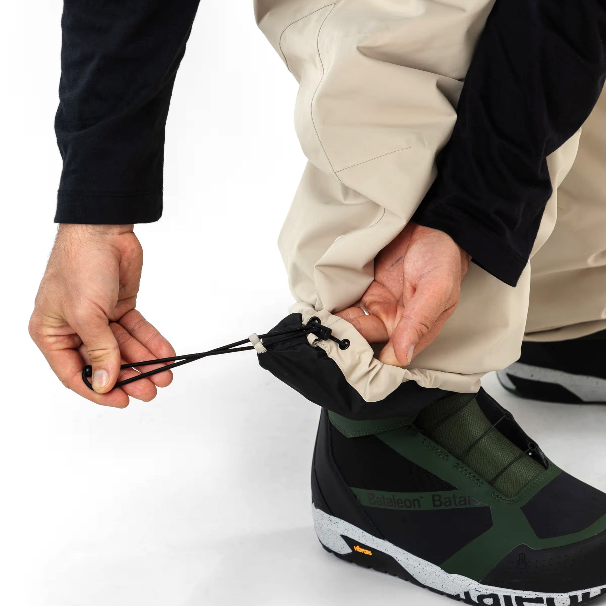 Beige Beyond Medals Park snowboard pant with a baggy fit cinch cuff