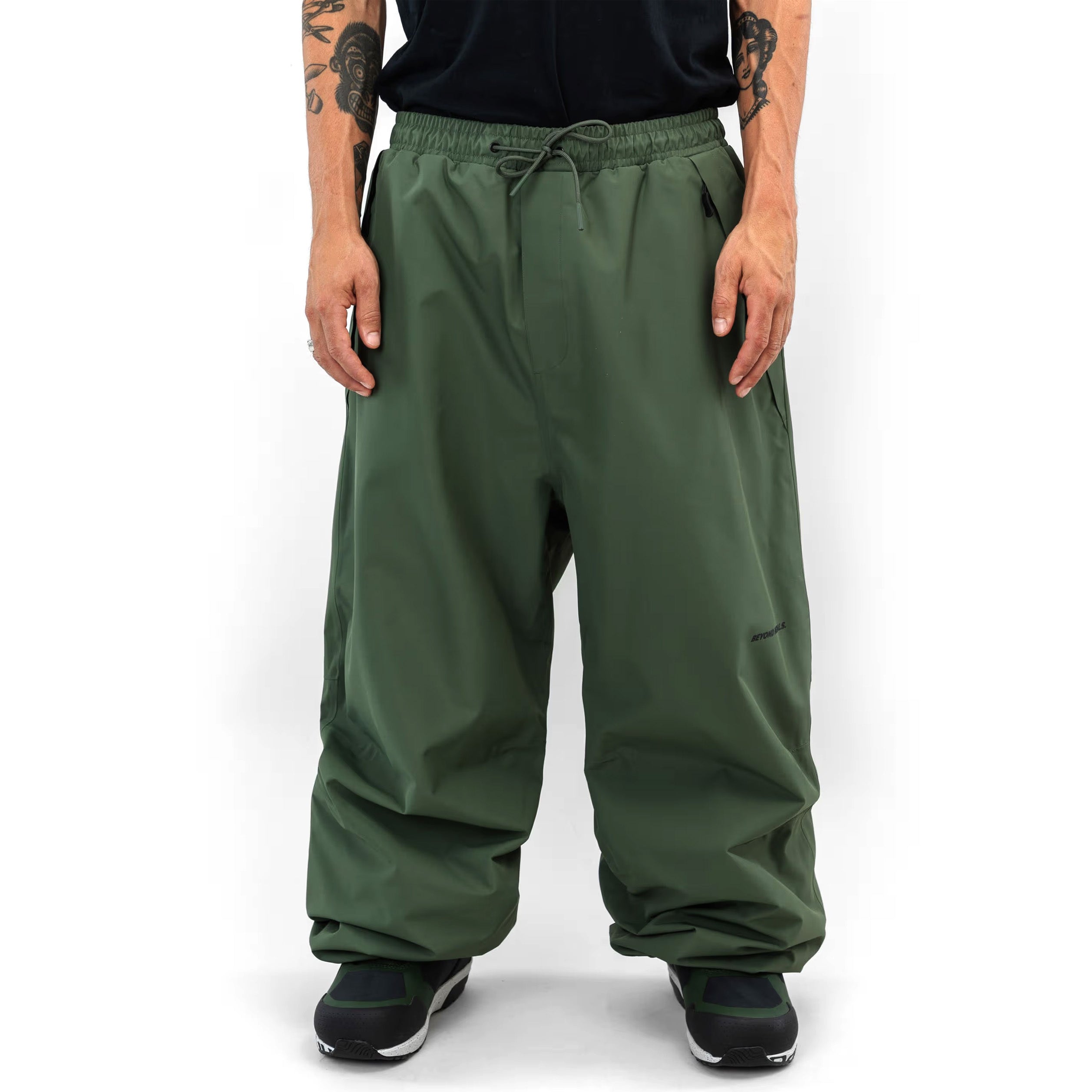 Green Beyond Medals Park snowboard pants with a baggy fit on body