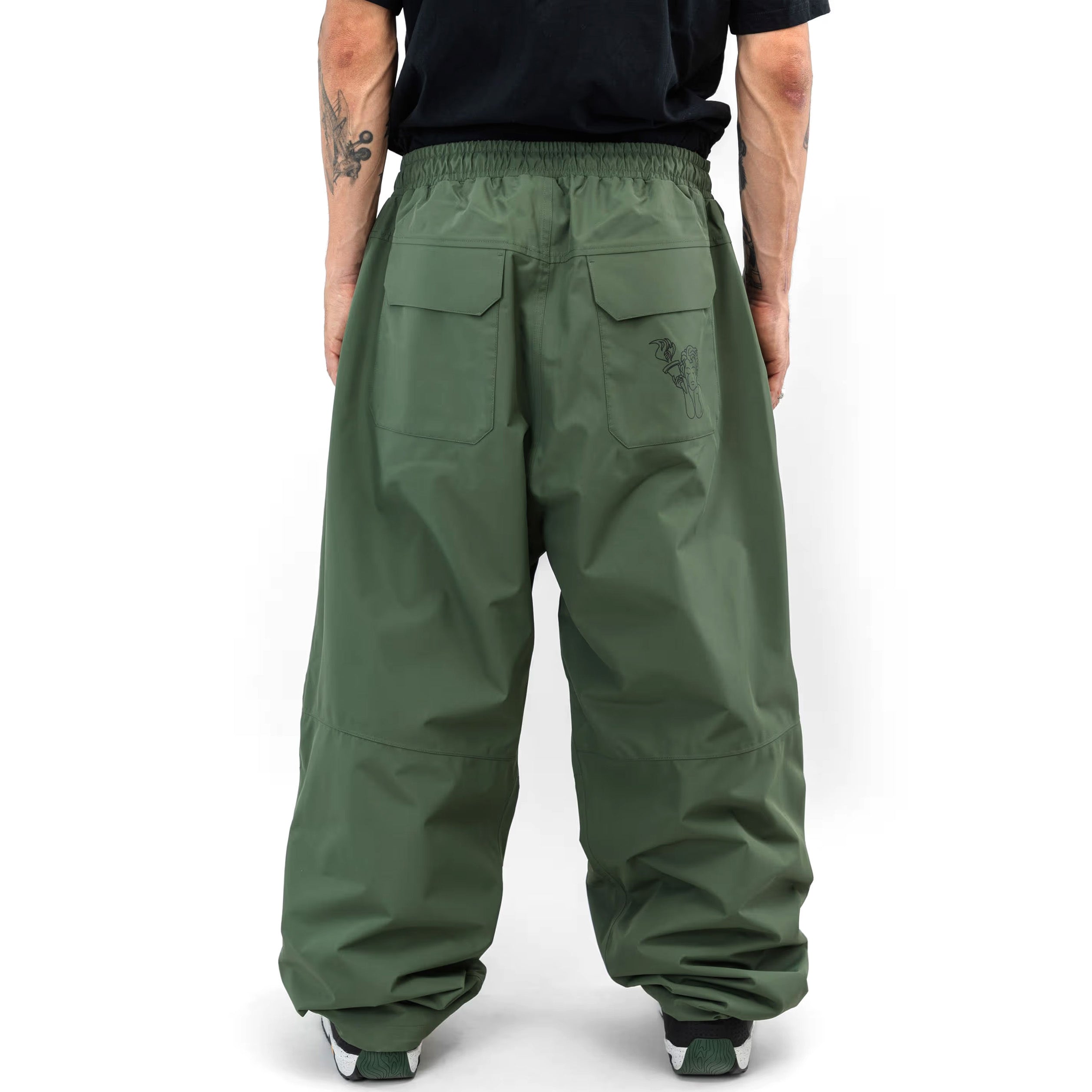 Green Beyond Medals Park snowboard pants with a baggy fit on body Back