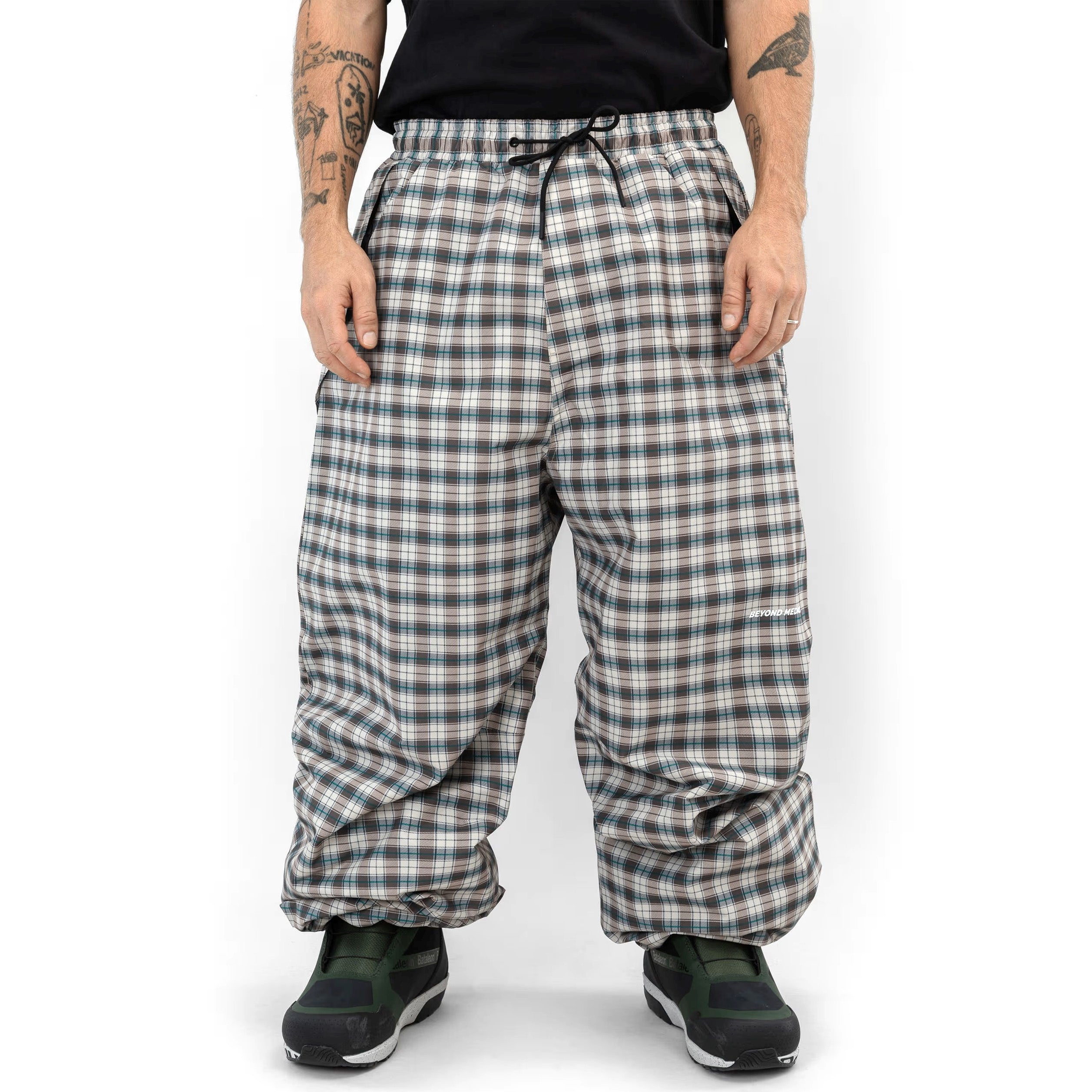 Beige Beyond Medals Park snowboard pant with a baggy fit on body