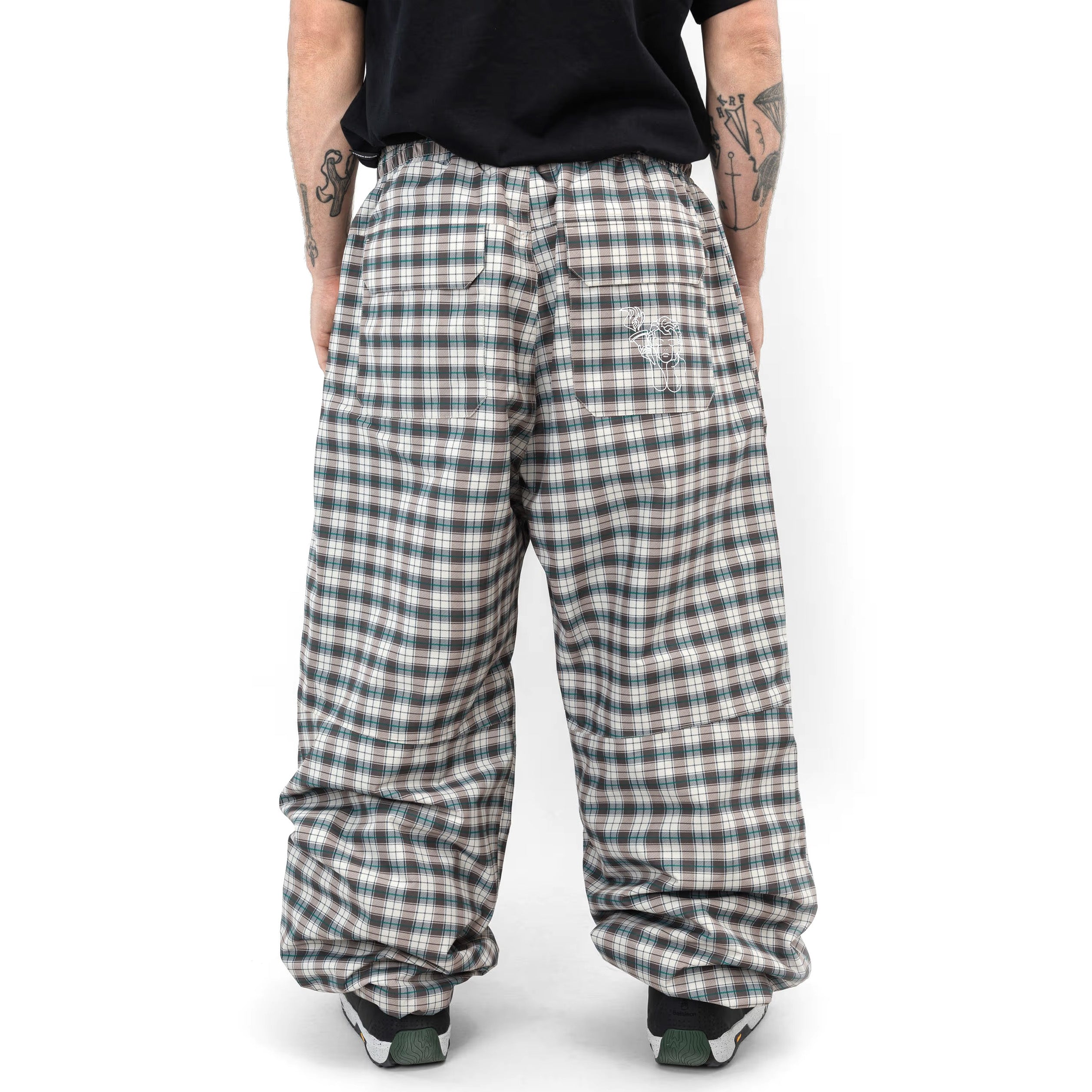 Beige Beyond Medals Park snowboard pant with a baggy fit on body back