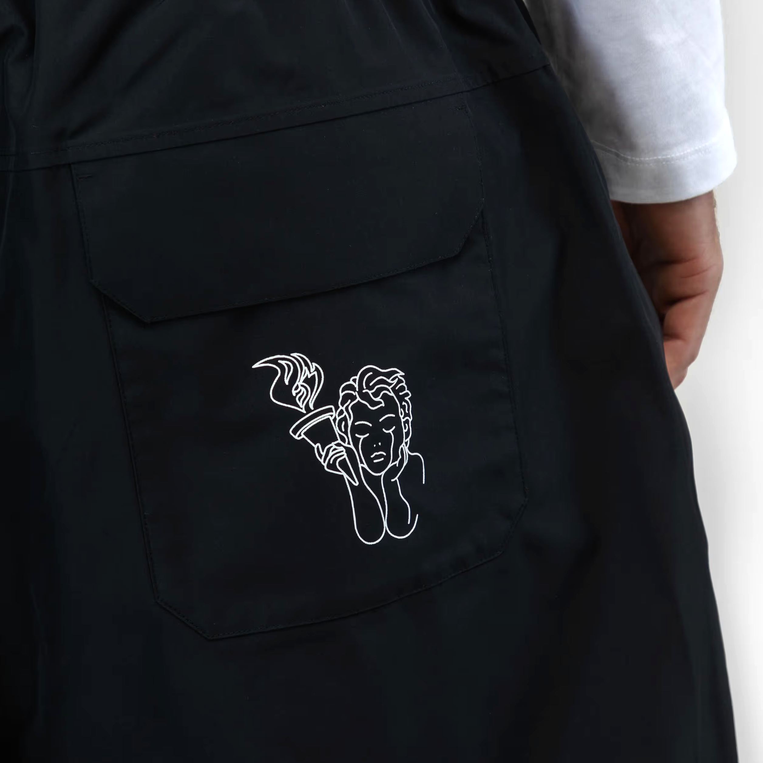 Black Beyond Medals Park snowboard pants with a baggy fit pocket detail