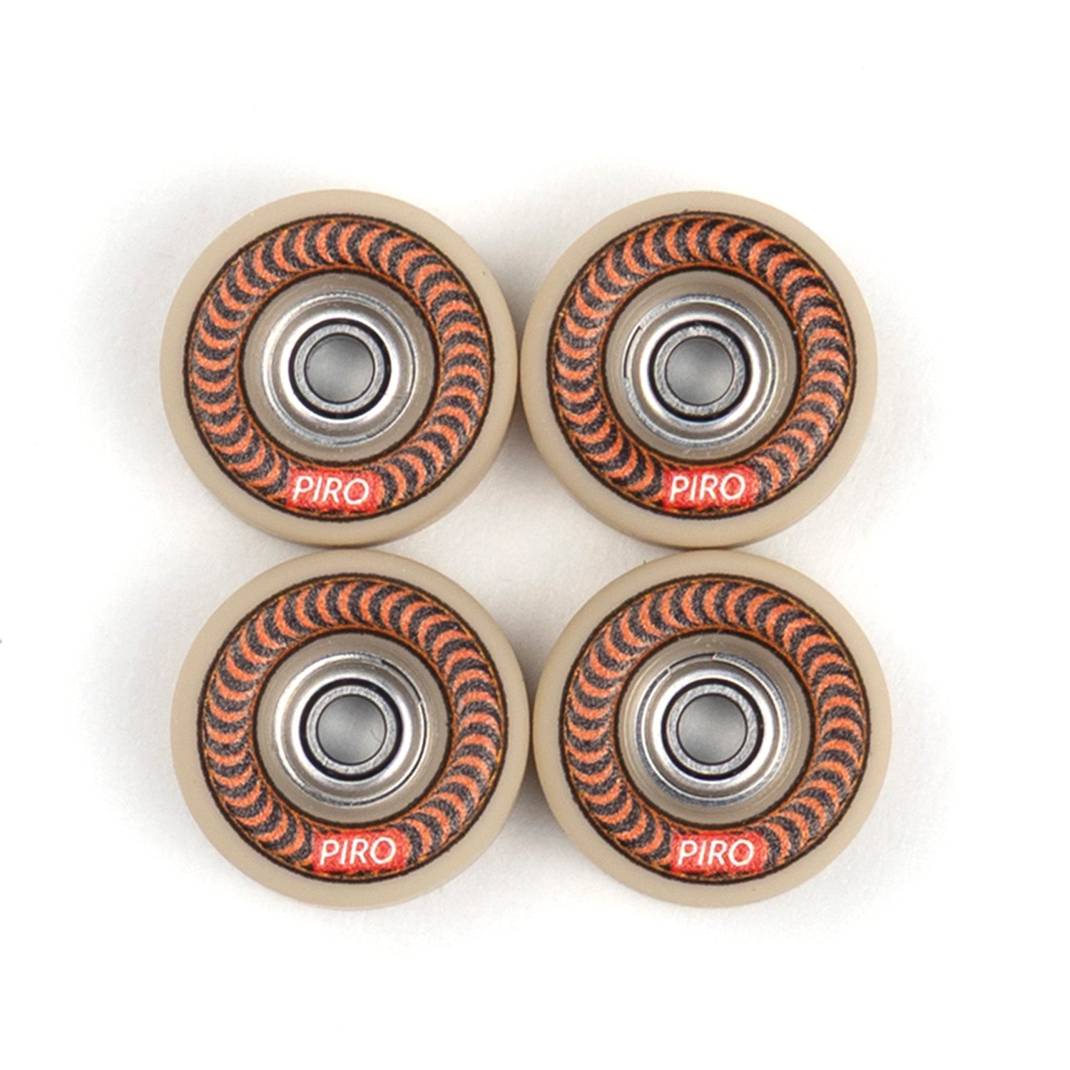 Tan Piro fingerboard wheels with a orange spiral graphic