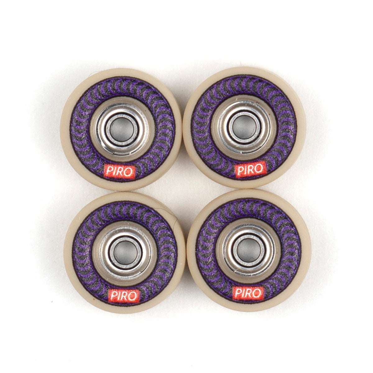 Tan Piro fingerboard wheels with a purple spiral graphic