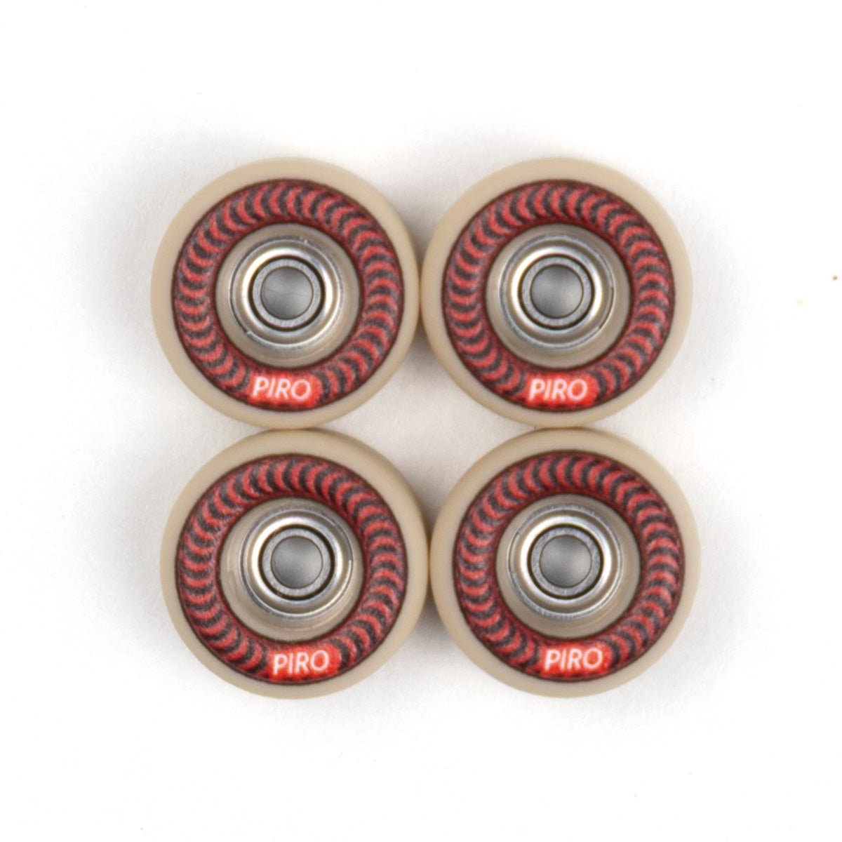 Tan Piro fingerboard wheels with a red spiral graphic