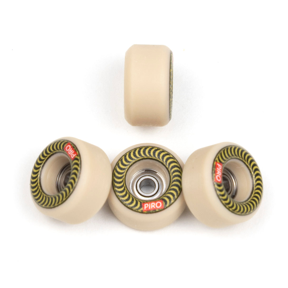 Tan Piro fingerboard wheels on the performance shape, with a green spiral graphic