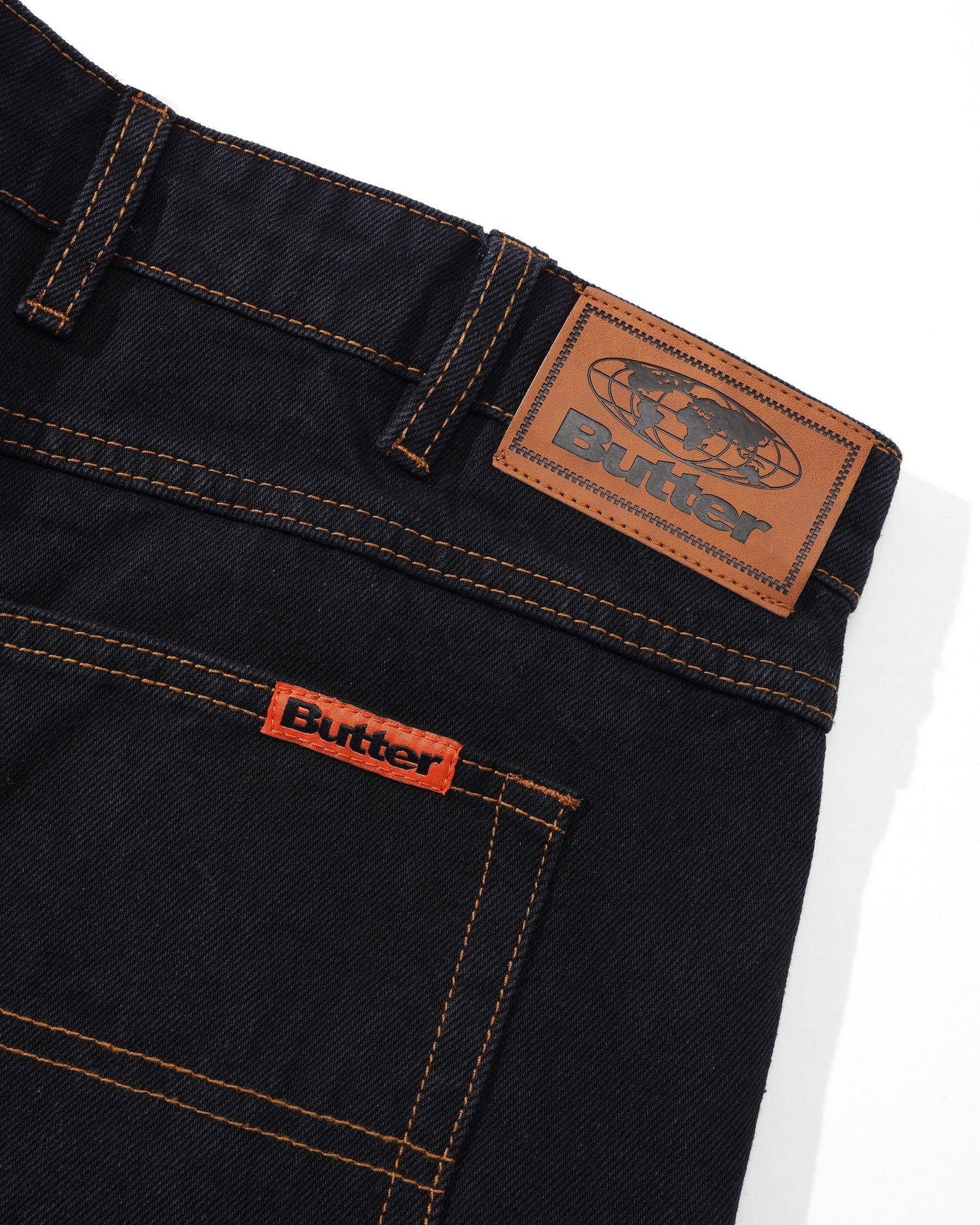 Washed black Butter Goods Relaxed skate jeans with leather patch