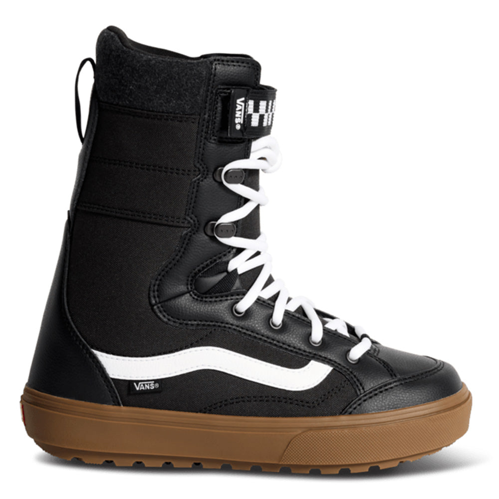 Black and gum Vans linerless DX boot with a white stripe and laces