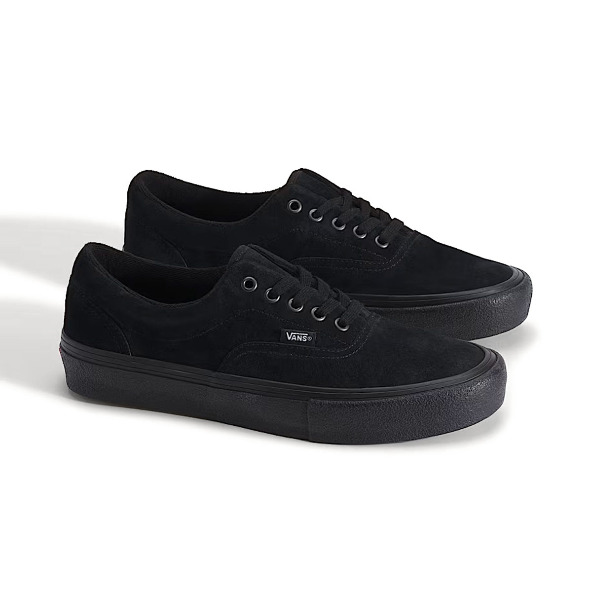 Pair of all black Vans Skate Era shoes