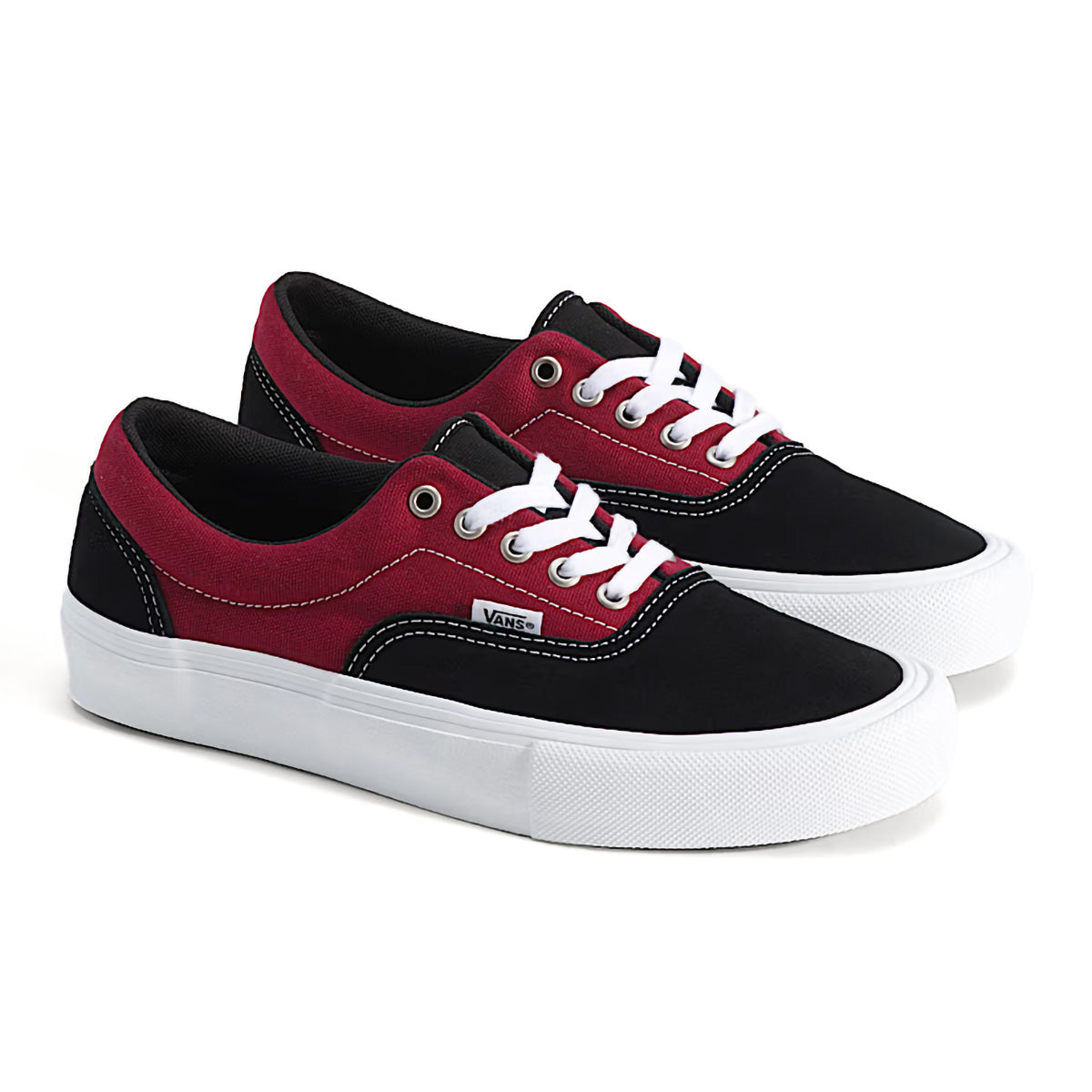 Pair of dark red and black Vans skate Era shoes 