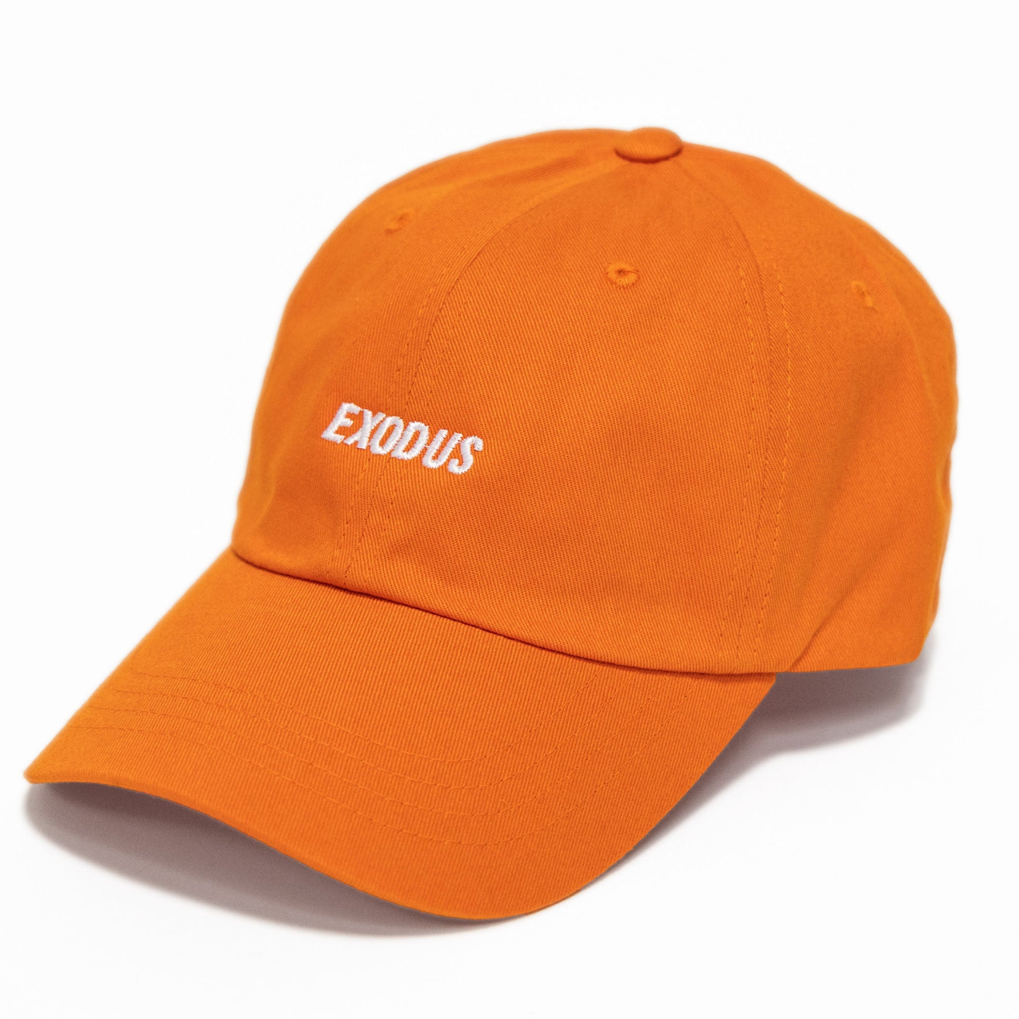 Orange skateboarding dad hat with white Exodus logo embroidery
